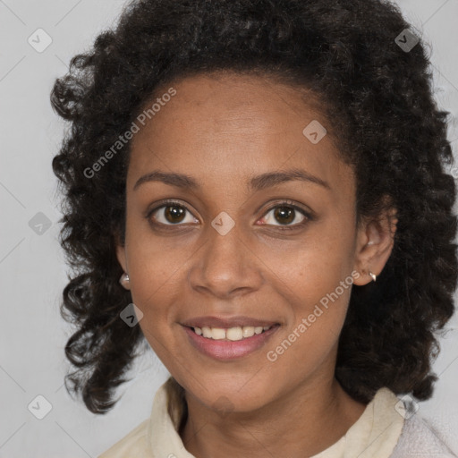 Joyful black young-adult female with medium  brown hair and brown eyes