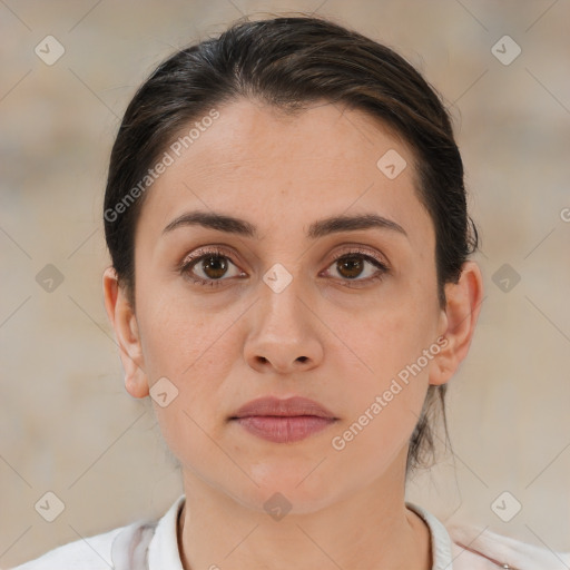 Neutral white young-adult female with medium  brown hair and brown eyes