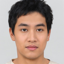 Neutral asian young-adult male with short  brown hair and brown eyes