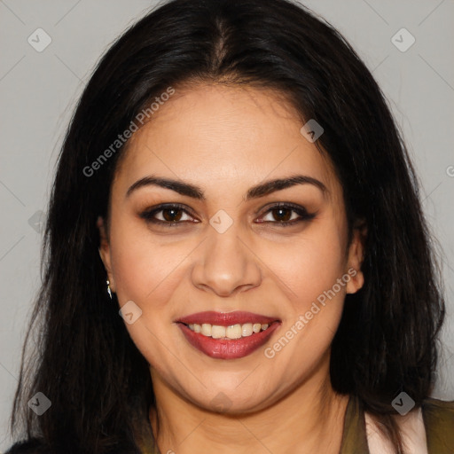 Joyful latino young-adult female with long  brown hair and brown eyes