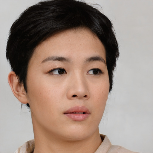 Neutral asian young-adult female with short  brown hair and brown eyes