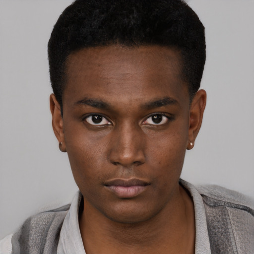 Neutral black young-adult male with short  black hair and brown eyes