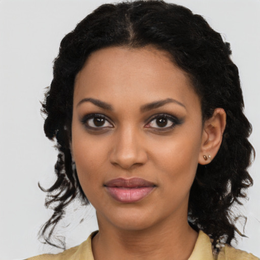 Joyful latino young-adult female with medium  black hair and brown eyes
