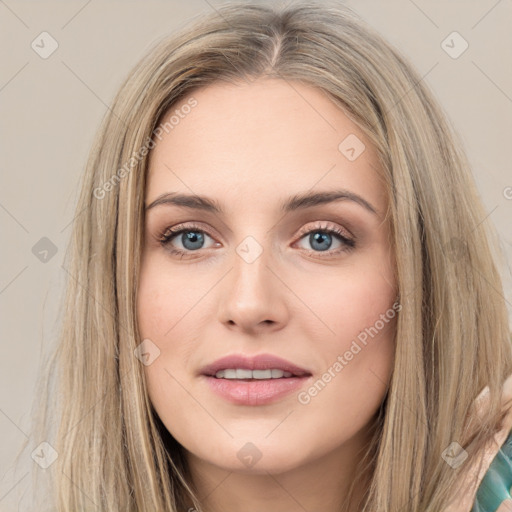 Joyful white young-adult female with long  brown hair and green eyes