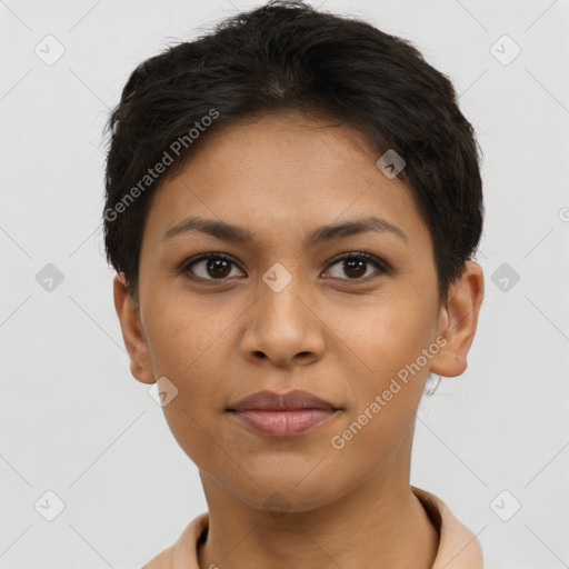 Joyful latino young-adult female with short  brown hair and brown eyes