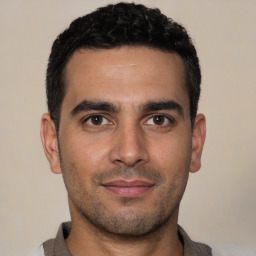 Neutral white young-adult male with short  black hair and brown eyes