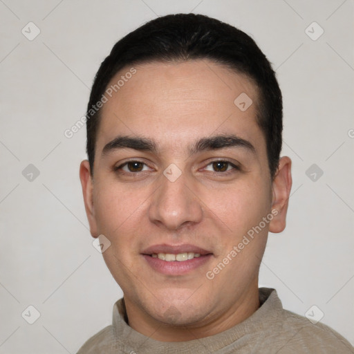 Joyful white young-adult male with short  black hair and brown eyes