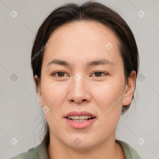 Joyful asian young-adult female with medium  brown hair and brown eyes