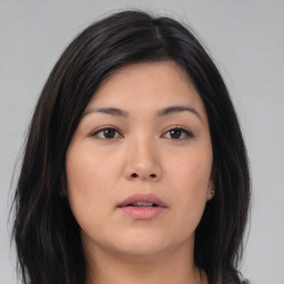 Neutral asian young-adult female with medium  brown hair and brown eyes