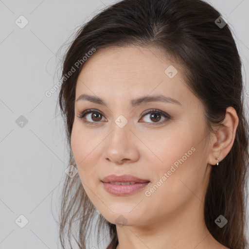 Joyful white young-adult female with medium  brown hair and brown eyes