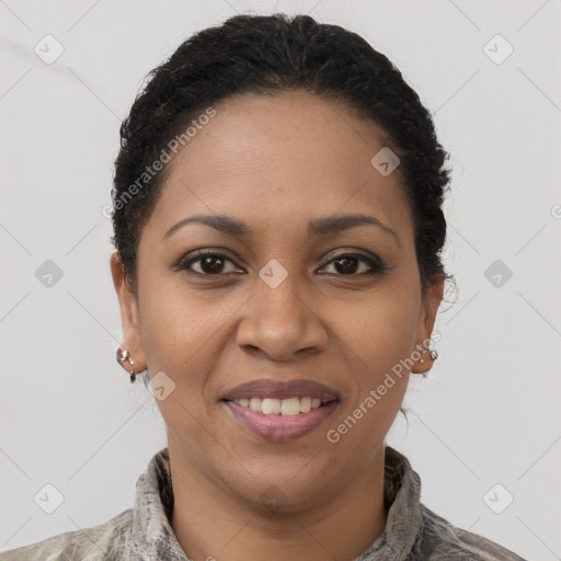 Joyful latino young-adult female with short  brown hair and brown eyes