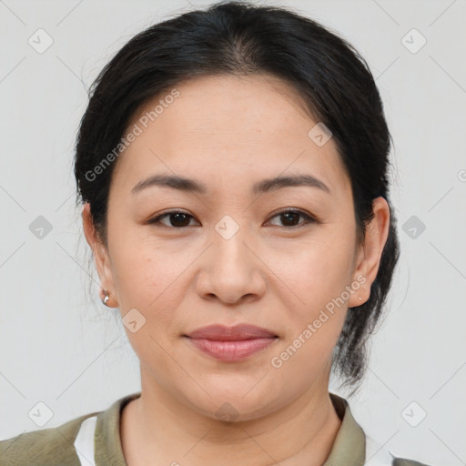 Joyful asian young-adult female with medium  brown hair and brown eyes