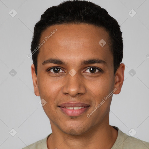 Joyful black young-adult male with short  black hair and brown eyes