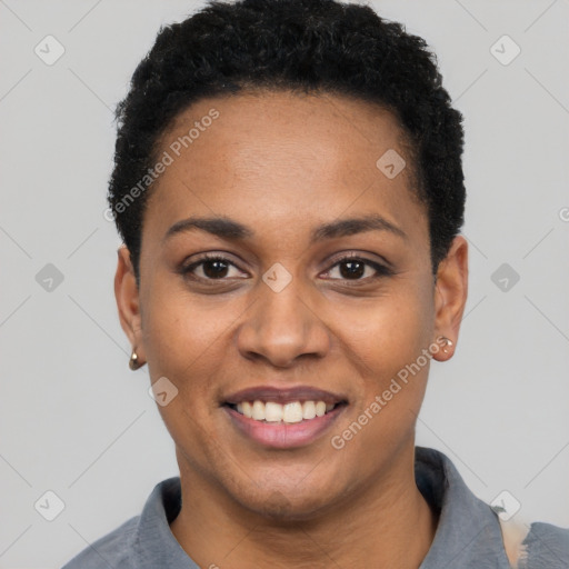 Joyful black young-adult female with short  black hair and brown eyes