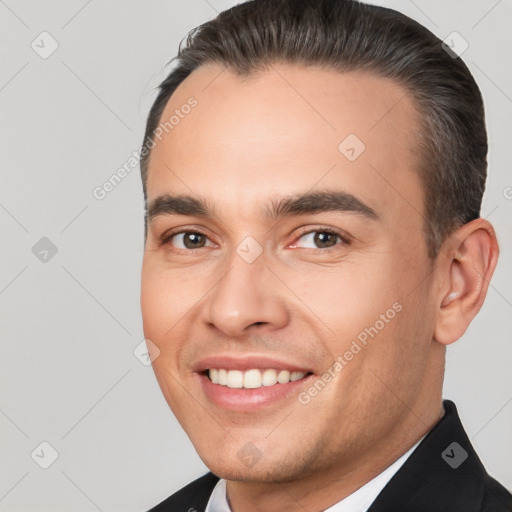 Joyful white young-adult male with short  brown hair and brown eyes