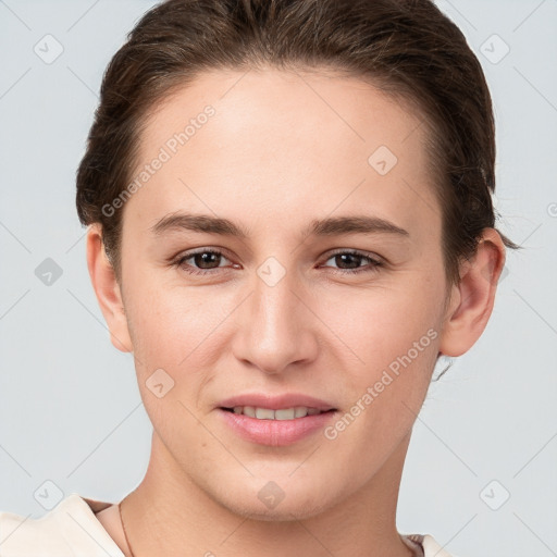 Joyful white young-adult female with short  brown hair and brown eyes