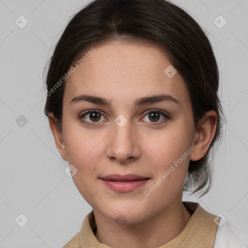 Joyful white young-adult female with medium  brown hair and grey eyes