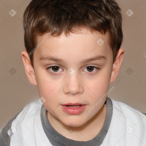 Joyful white child male with short  brown hair and brown eyes