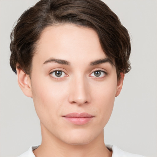 Neutral white young-adult female with short  brown hair and brown eyes