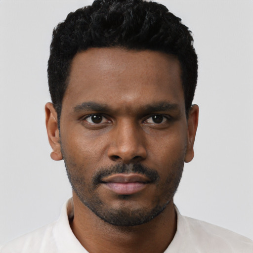 Neutral black young-adult male with short  black hair and brown eyes