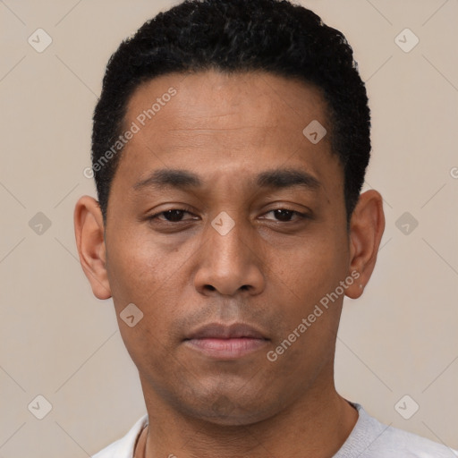 Neutral latino young-adult male with short  black hair and brown eyes