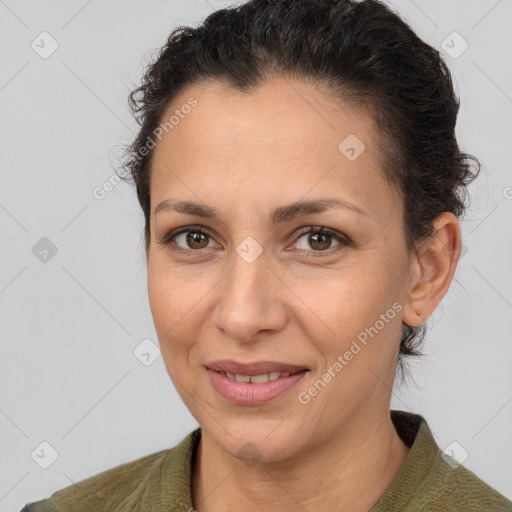 Joyful white adult female with short  brown hair and brown eyes