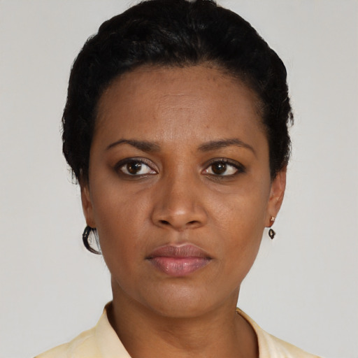 Neutral latino young-adult female with short  black hair and brown eyes