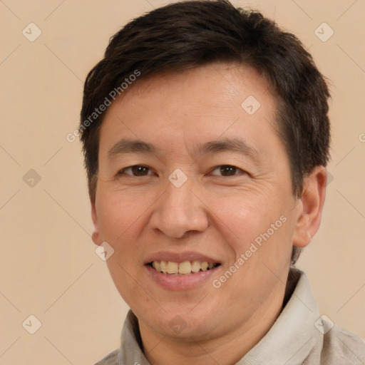 Joyful white adult male with short  brown hair and brown eyes