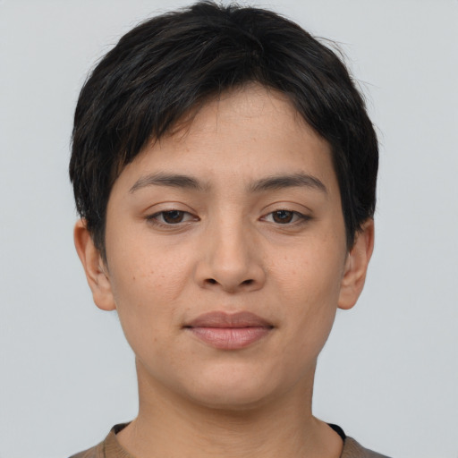 Joyful asian young-adult female with short  brown hair and brown eyes