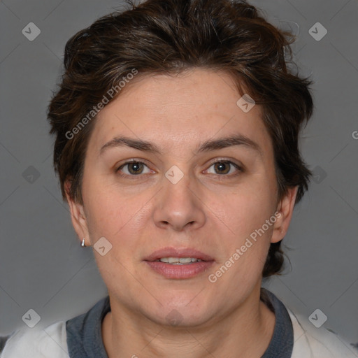 Joyful white adult female with short  brown hair and brown eyes