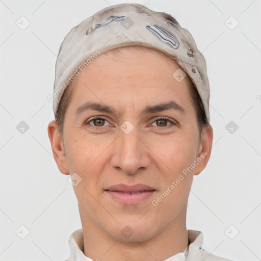 Joyful white adult male with short  brown hair and brown eyes