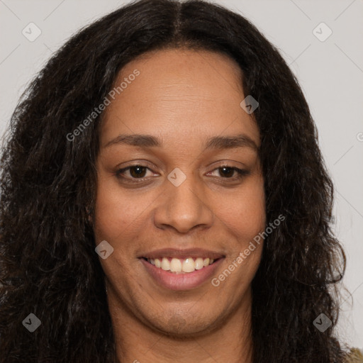 Joyful latino young-adult female with long  brown hair and brown eyes