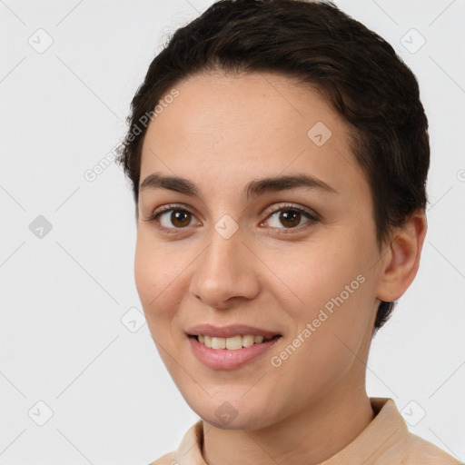 Joyful white young-adult female with short  brown hair and brown eyes