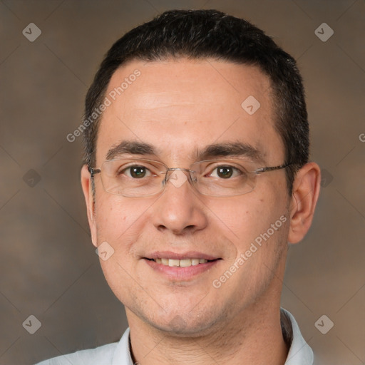 Joyful white adult male with short  brown hair and brown eyes