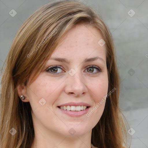 Joyful white young-adult female with medium  brown hair and blue eyes