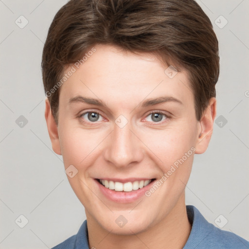 Joyful white young-adult female with short  brown hair and grey eyes