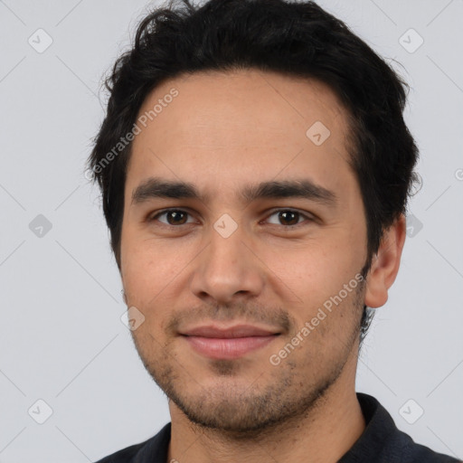 Joyful white young-adult male with short  black hair and brown eyes