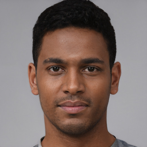 Neutral black young-adult male with short  black hair and brown eyes