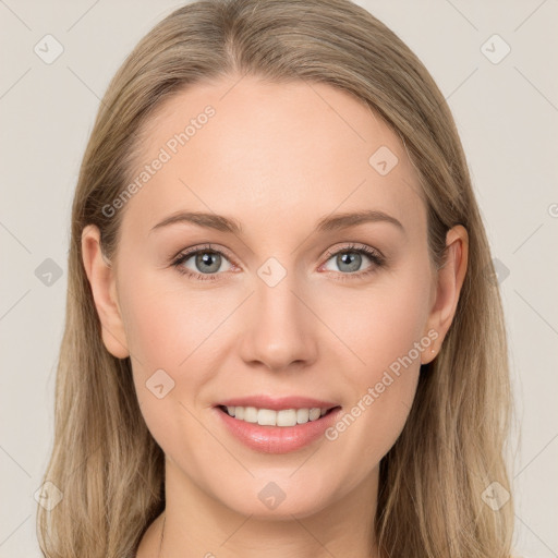 Joyful white young-adult female with long  brown hair and blue eyes