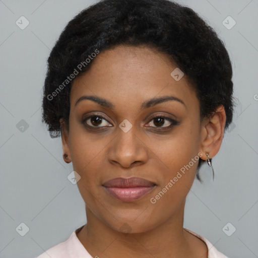 Joyful black young-adult female with short  black hair and brown eyes