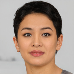 Joyful asian young-adult female with short  black hair and brown eyes