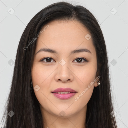 Joyful asian young-adult female with long  brown hair and brown eyes