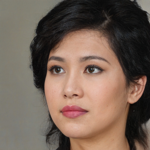 Neutral asian young-adult female with medium  black hair and brown eyes
