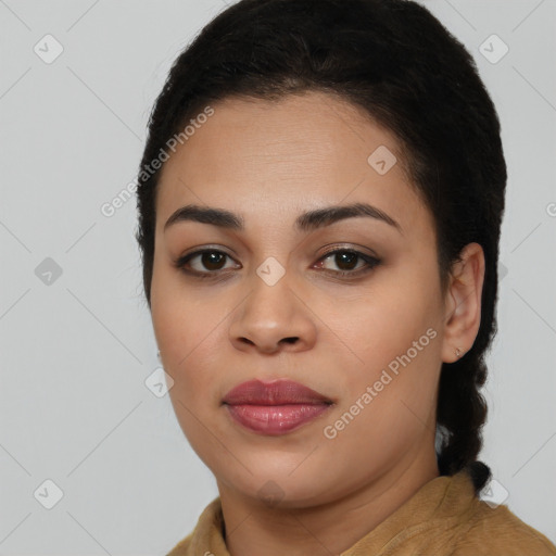 Joyful latino young-adult female with long  brown hair and brown eyes