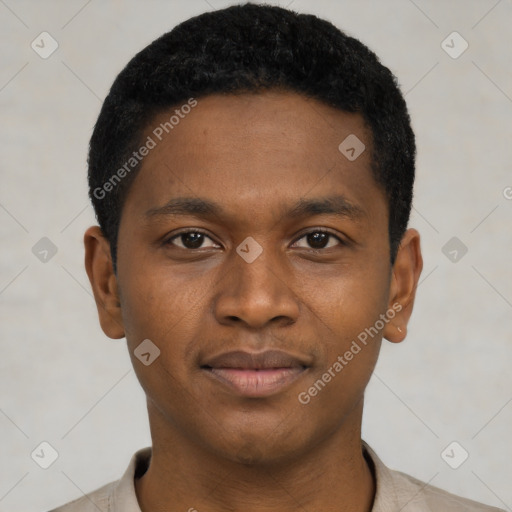 Joyful black young-adult male with short  black hair and brown eyes