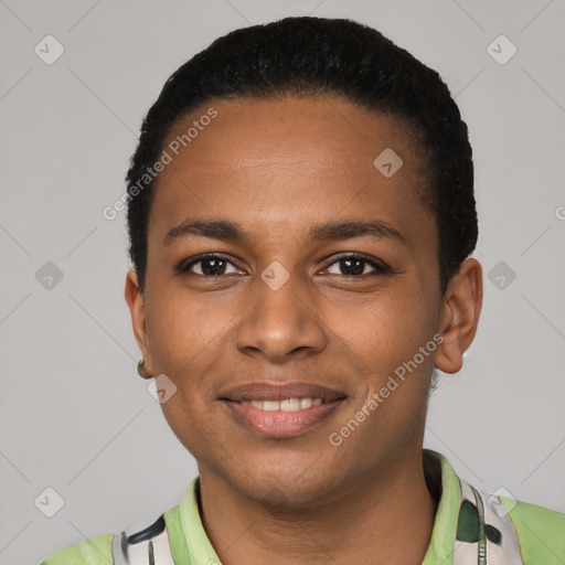 Joyful black young-adult female with short  black hair and brown eyes