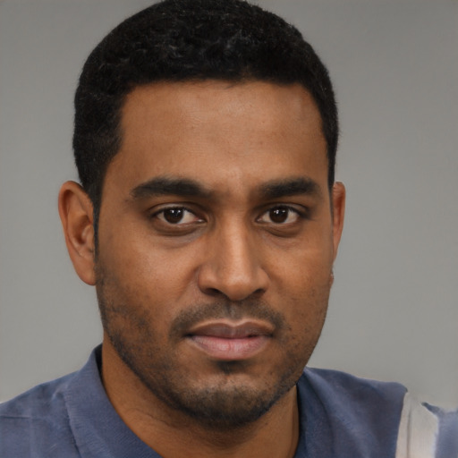 Neutral black young-adult male with short  black hair and brown eyes