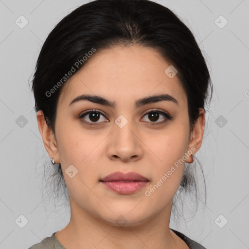 Joyful latino young-adult female with medium  brown hair and brown eyes