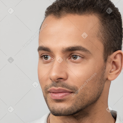 Neutral white young-adult male with short  brown hair and brown eyes