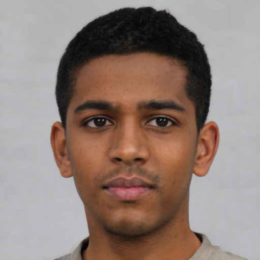 Neutral black young-adult male with short  black hair and brown eyes